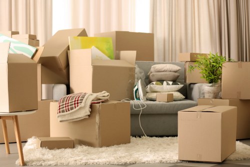Packers organising household items for packing services in Harefield