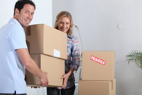 Packed moving boxes ready for man and van transport in Harefield